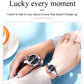 Couple quartz watches on wrists with black dials and silver metal link straps