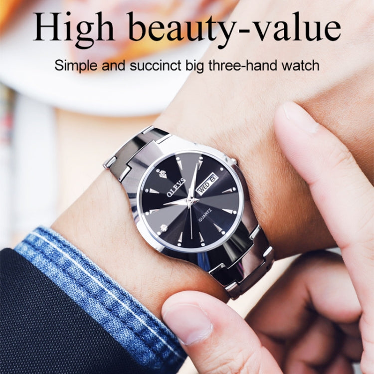 Black quartz wristwatch with luminous accents and date window, on a metal link strap
