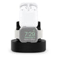Three-in-one charging holder with dark base, AirPods case, and Apple Watch display