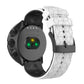 Two-tone silicone watch band with black top and white underside, geometric texture