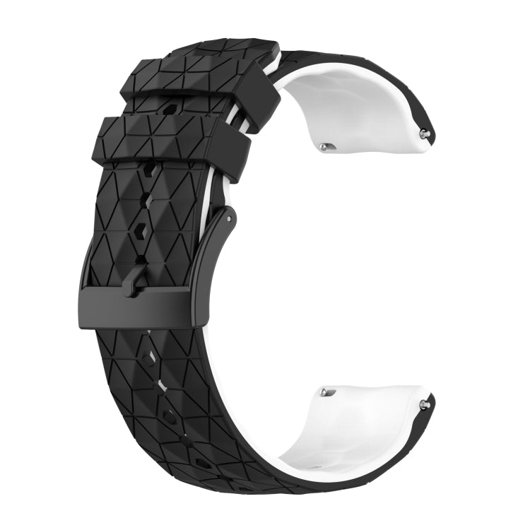 Two-tone silicone watch band with black top and white underside, geometric texture