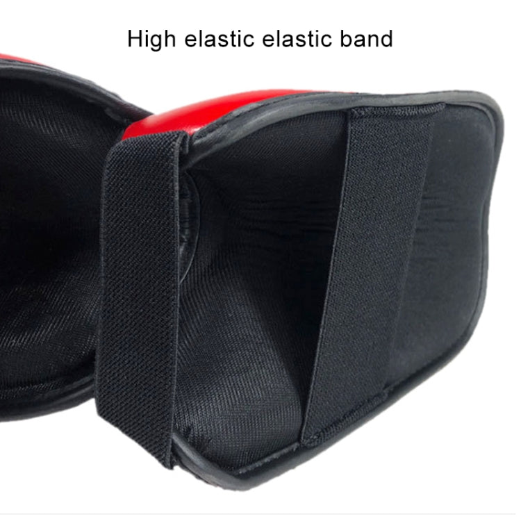 Black elastic strap on padded shin and ankle guard for secure fit