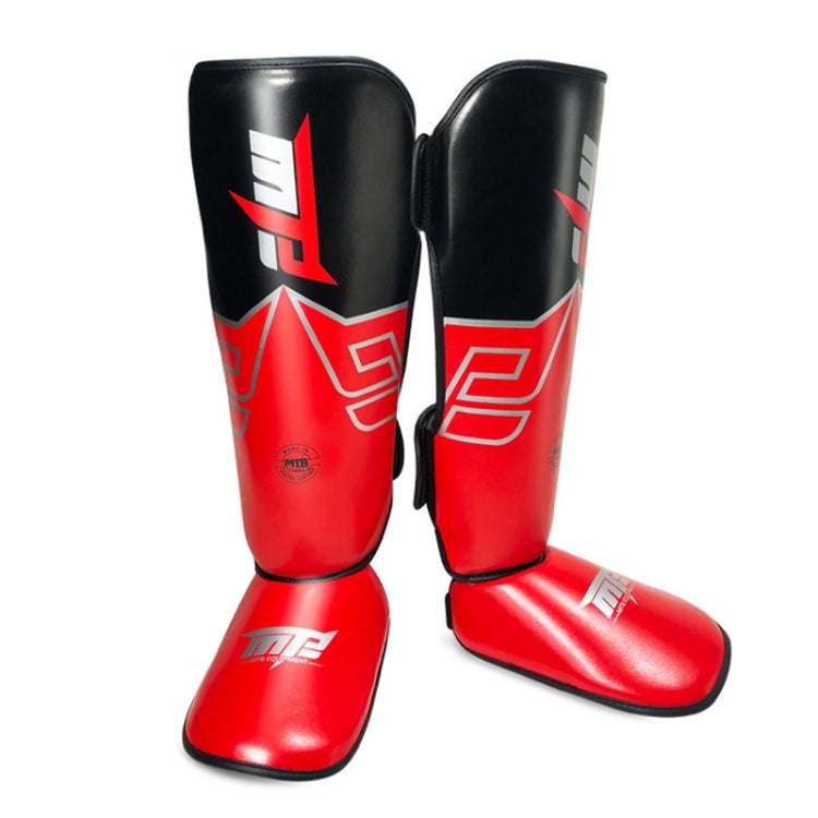 Red Thai boxing leg guards with black calf panels and ankle strap protectors