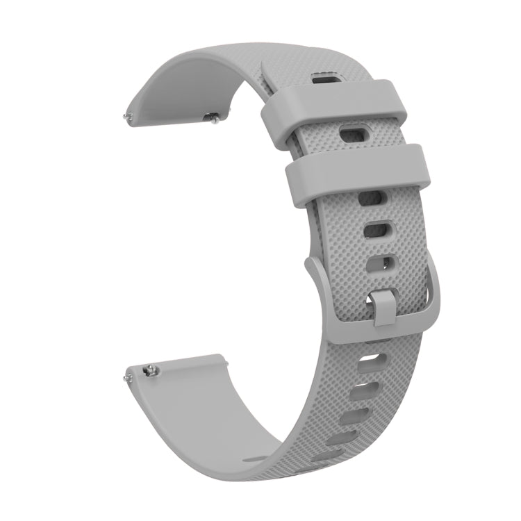 Gray silicone watch strap with tonal pockmarked texture, buckle clasp and strap holes