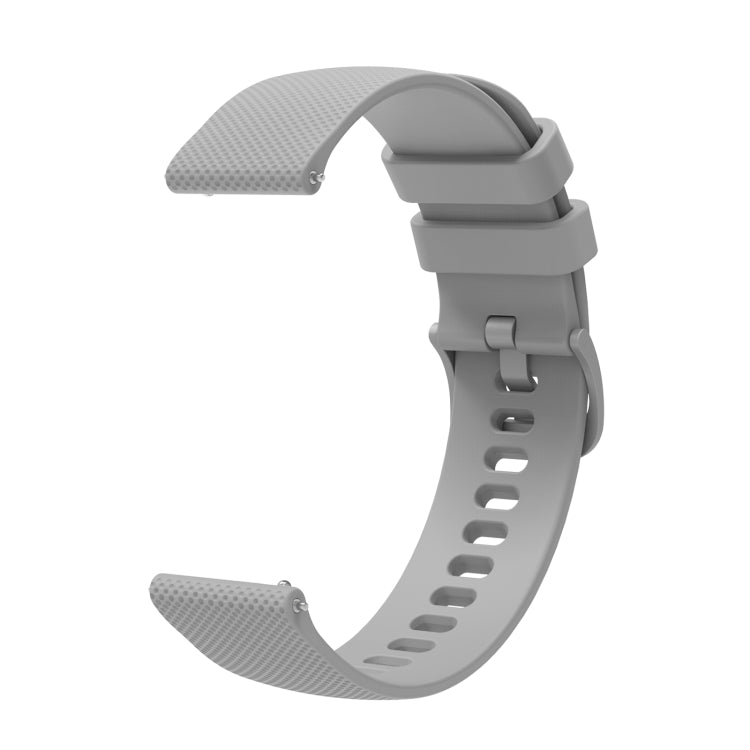 Medium gray silicone watch strap with tonal pockmarked texture, buckle clasp and strap holes