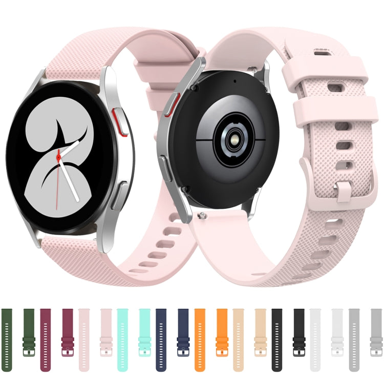 Light pink silicone watch strap with tonal pockmarked texture, buckle clasp and strap holes
