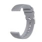 Light gray silicone watch strap with silver-tone buckle and perforated links