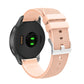 Silicone watch strap with textured pockmarked surface and silver buckle, peach band