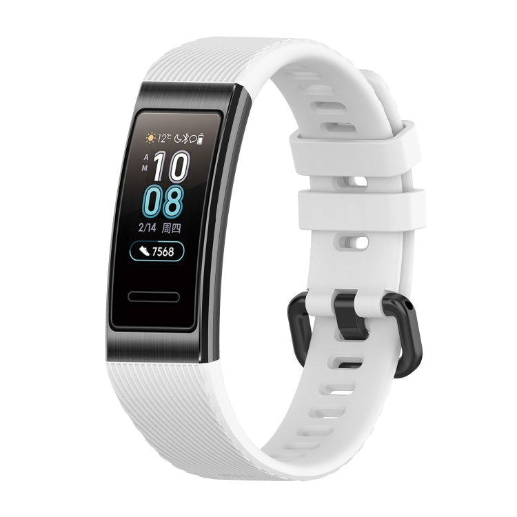 White silicone watch strap with smartwatch display and quick-release buckle