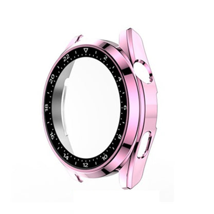 Pink electroplated watch case with black bezel ring and top side button openings