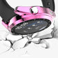 Pink electroplated watch case with black bezel and crown on a cracked base