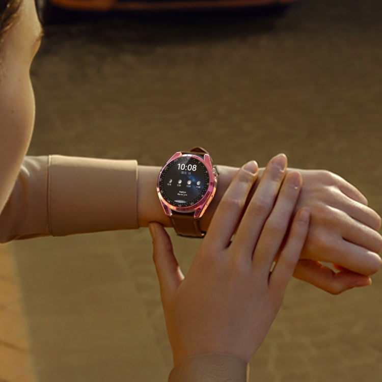 Pink electroplated smartwatch case on a wrist with black strap