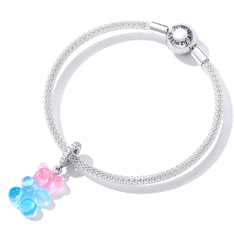 Silver snake-chain bracelet with pink and blue resin bear pendant