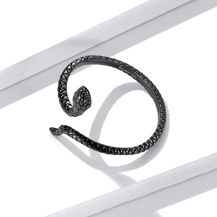 Sterling silver snake ring with purple stone detail