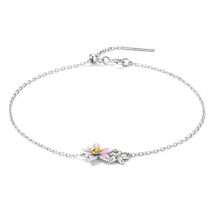 Sterling silver chain bracelet with pink cherry blossom flower charm and small silver leaves
