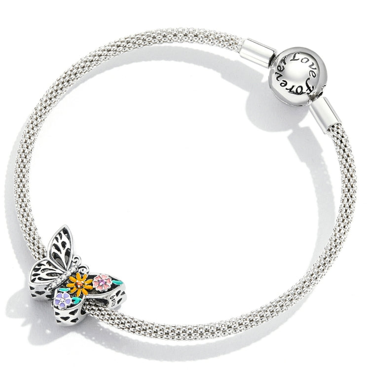 Sterling silver mesh bracelet with butterfly flower charm and multicolor enamel inlay