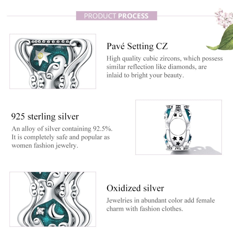 Silver sun and moon hourglass charm with teal enamel, pave-style CZ detailing