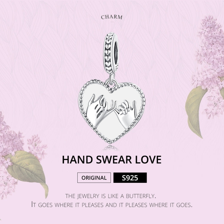 Sterling silver heart charm pendant with hand-swearing hands motif and loop bail