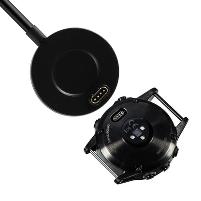 Round black charging base with charging connector for Garmin watches