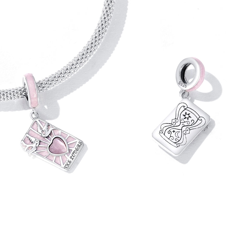 Sterling silver charm bracelet with pink enamel tarot card pendant and heart on link chain