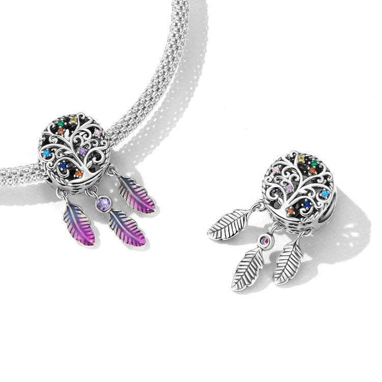Silver chain necklace with sterling dreamcatcher bead charm, purple enamel feathers, and blue stones.