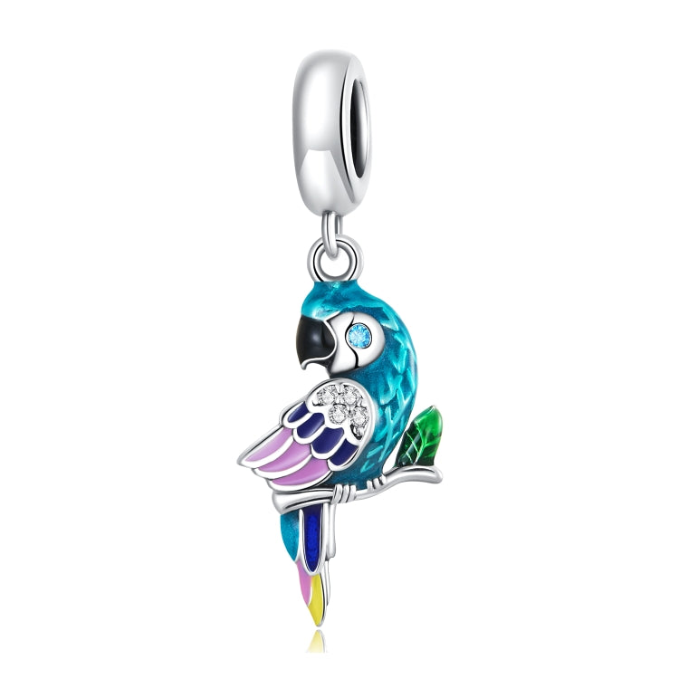 Turquoise and purple parrot enamel pendant charm with crystal-like details and silver loop