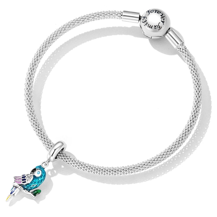 Silver mesh bracelet with parrot pendant charm and round clasp, turquoise and purple enamel