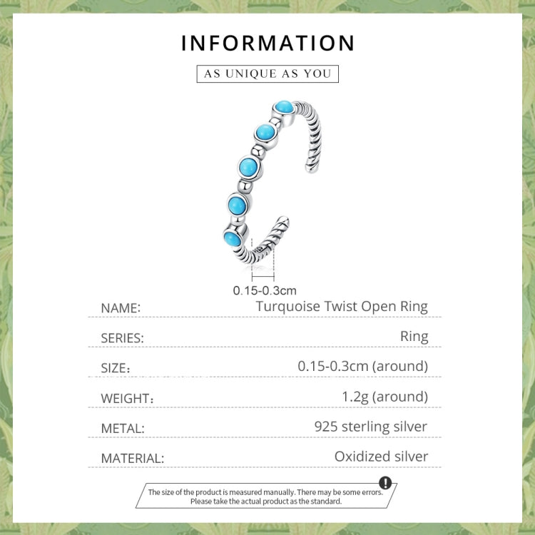 Turquoise twist open ring with ridged silver band and round blue cabochon stones