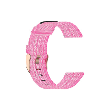 Pink nylon canvas watch strap with metal buckle and perforation slots