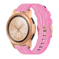 Pink nylon canvas watch strap with rose-gold smartwatch case and dial
