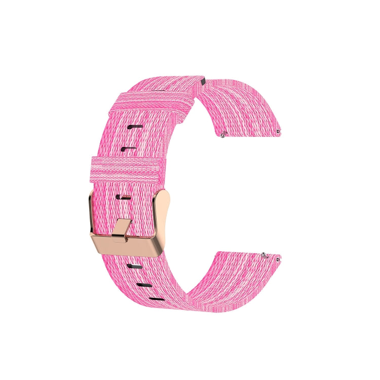 Pink nylon canvas watch strap with metal buckle, shown from a side angle