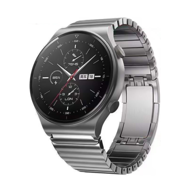 Silver steel watch band with buckle, brushed metal links and curved clasp