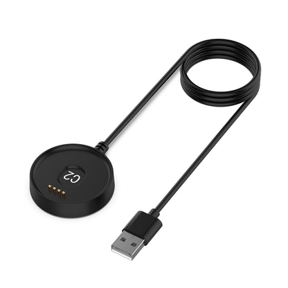 Black charging dock puck with gold contacts and USB-A data cable