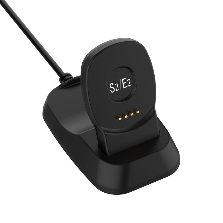 Black charging base with S2/E2 label and gold contact pins, USB cable connection