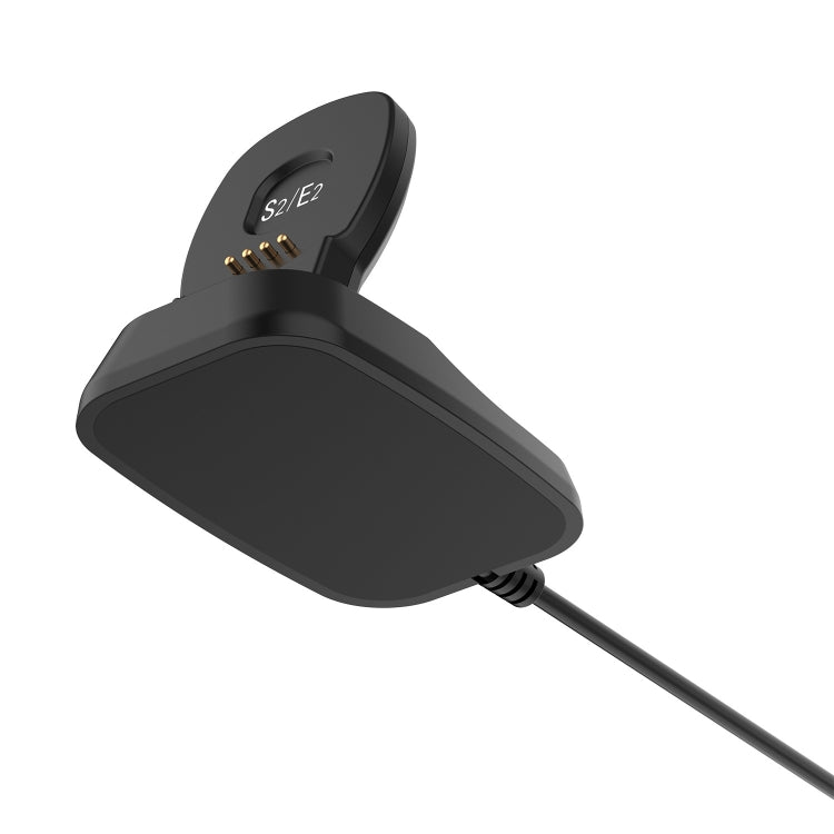 Black charging dock with S2/E2 top module and gold contacts, connected cable
