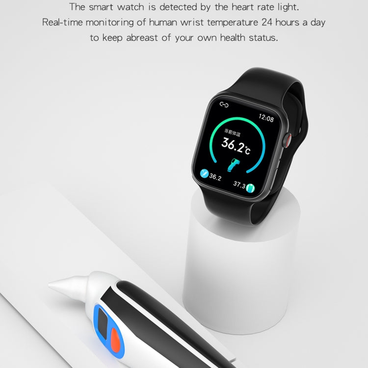 Black smartwatch on stand with green circular temperature-style display