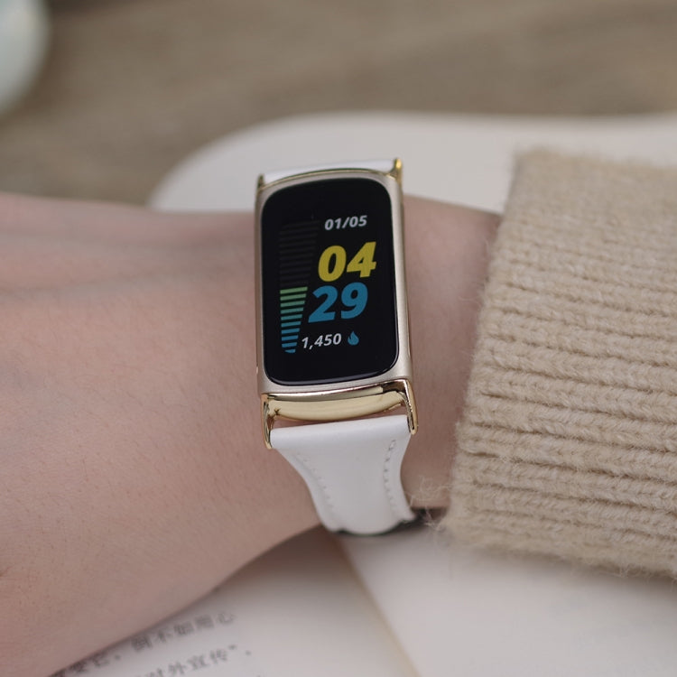 White leather slim watch band with gold-tone buckle on wrist for Fitbit Charge 5