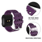 Breathable perforated TPU watch strap with quick-release for Fitbit Versa, dark purple.