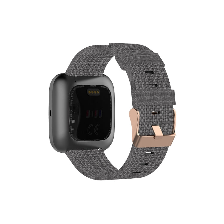 Canvas watch strap in dark gray with stitch holes for a smartwatch band