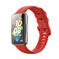Red silicone watch band with adjustable clasp and perforated strap holes
