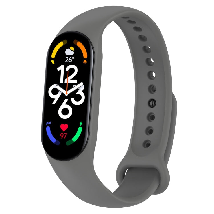 Gray silicone fitness watch band with perforated strap and oval display