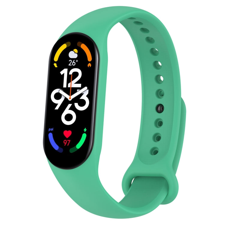 Green silicone fitness watch band with perforated strap and oval display