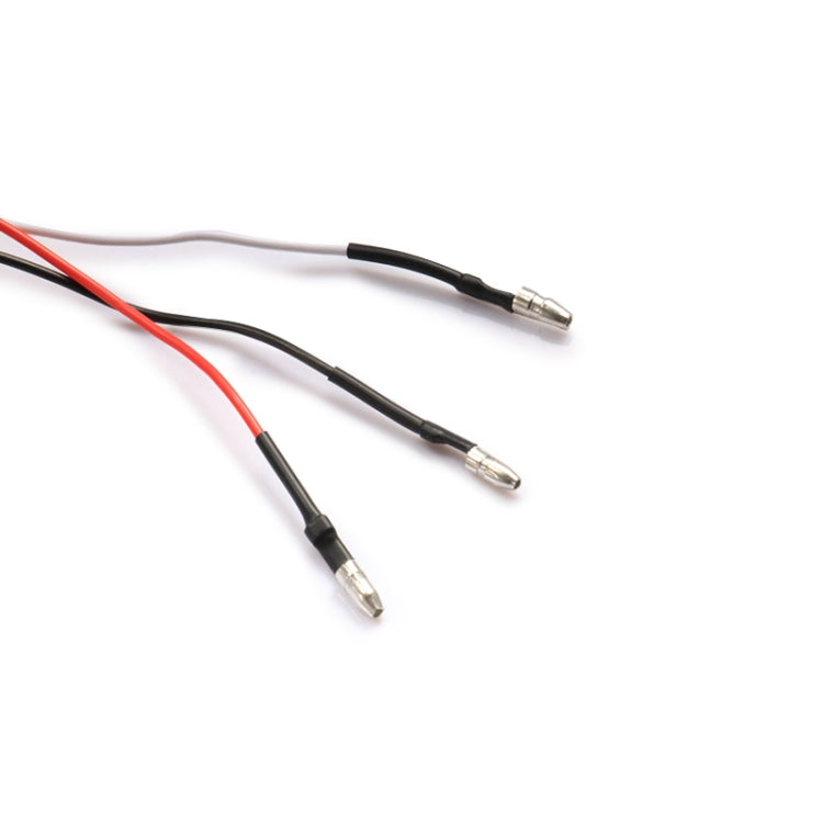 LED turn signal wiring with red and black leads and metal spade connectors.