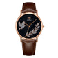 YAZOLE leather band watch with dove motif, brown strap, black dial, rose-gold case