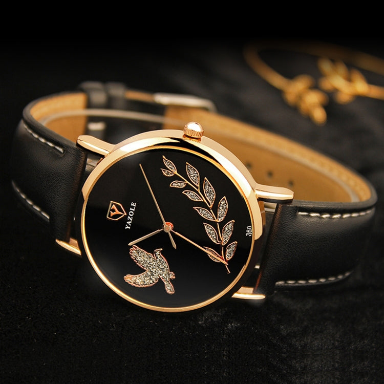 YAZOLE dove motif leather band watch, black strap, black dial, rose-gold case close-up