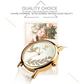 Round quartz wristwatch with white leather band, gold case, dove and diamond motif dial