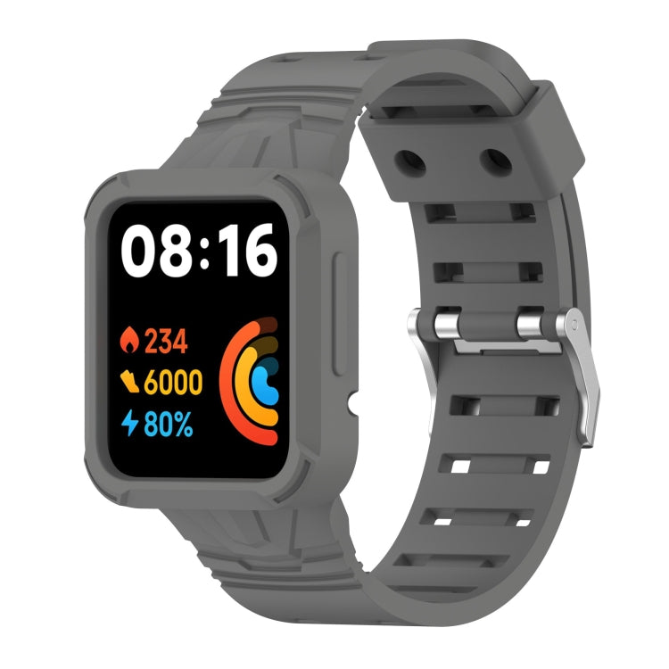 Dark gray silicone integrated watch band with metal clasp and strap holes, smartwatch shown