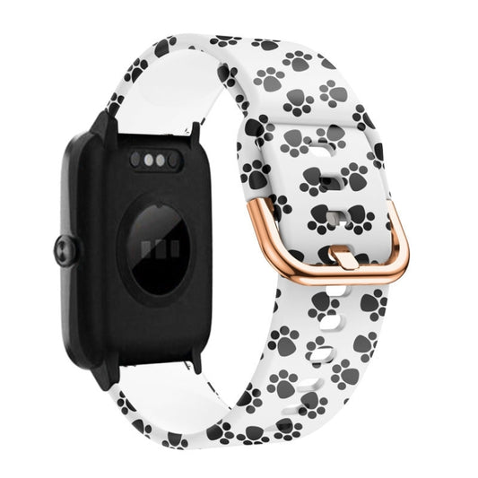 Silicone watch band with white base and black paw print pattern, rose-gold clasp