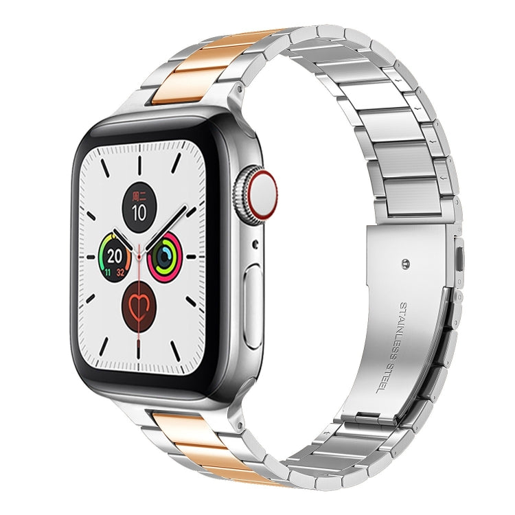 Stainless steel Apple Watch band with small links and orange/gold center strip accents