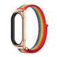 Rose gold smartwatch with rainbow red nylon mesh watch band, side view